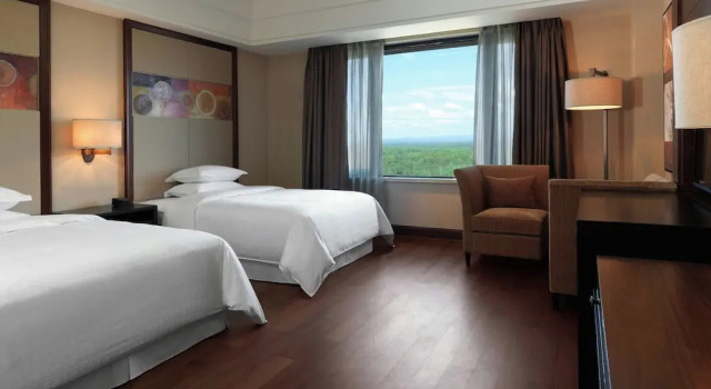 Четырёхместный номер Standard с балконом Sheraton Changbaishan Resort