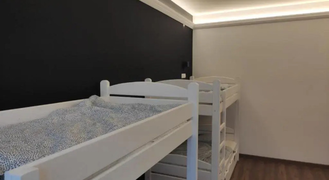 Кровать в общем номере Greg&Tom Hostel