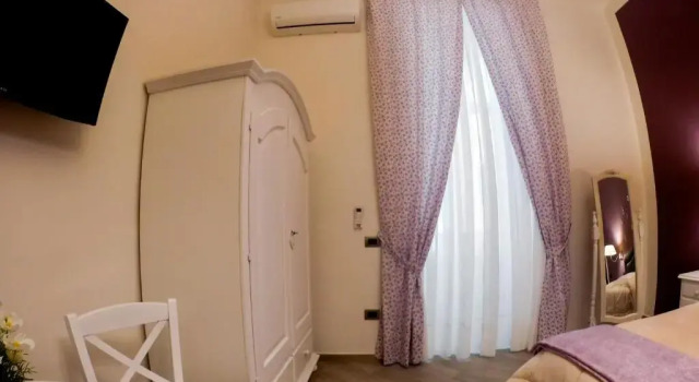 Четырёхместный номер Deluxe B&B Le Stanze di Santa Chiara