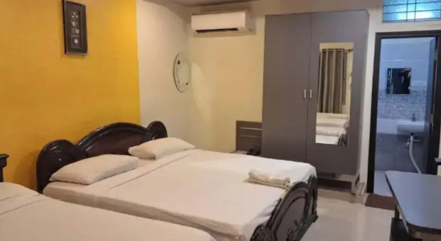 Deluxe quadruple chambre Hotel Pavan Mansion