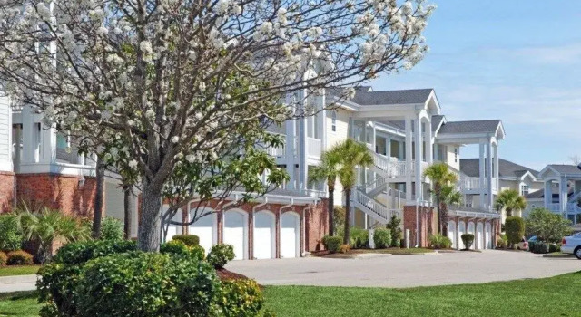 Magnolia Place 102 4765 2 Br condo by RedAwning