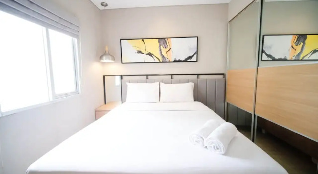 Minimalist and Beautiful 1BR with Extra Room at Pavilion Permata Apartment By Travelio, Book Apartment Hotels in East Java with a Pool, Swimming Pool