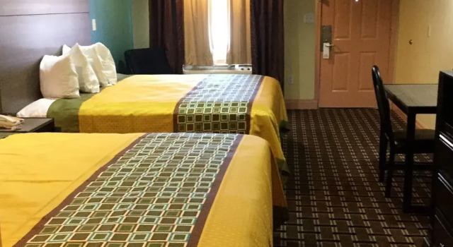 Четырёхместный номер Executive Luxury Inn and Suites Seaworld