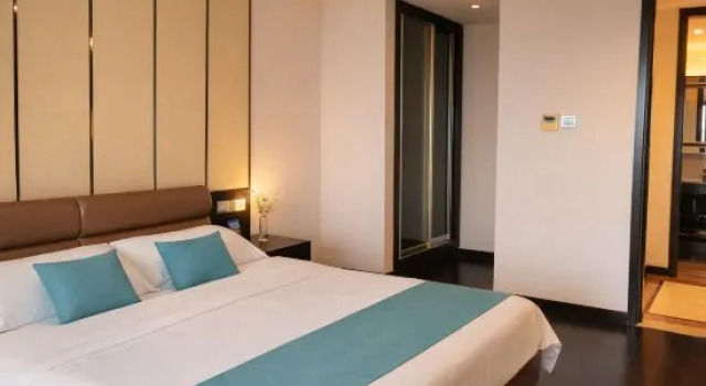 Четырёхместный люкс c 1 комнатой Cobblestone Holiday Apartment (Lingshui R&F Ocean Happy World)