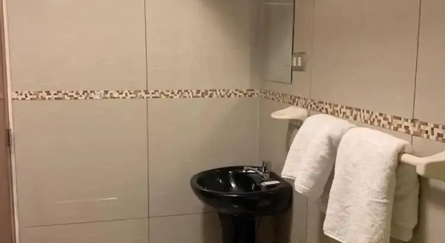 Standard- firedobbelt familie værelse med byudsigt Tariri Hotel