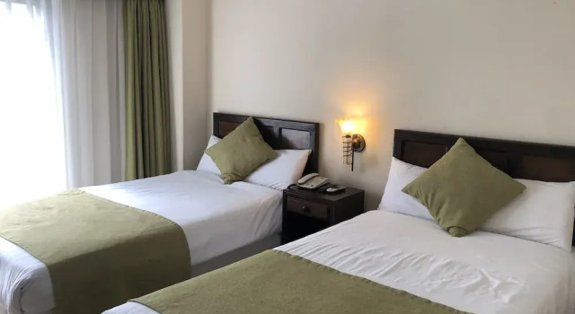 Двухместный номер Deluxe с балконом Holiday Saipan Hotel