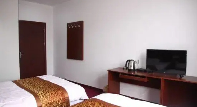 Kang Jie Hotel, Забронировать Отель Хецзе Шаньдун