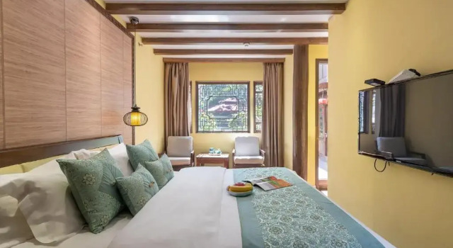 Номер Deluxe Lijiang Gui Yuan Tian Ju Guesthouse