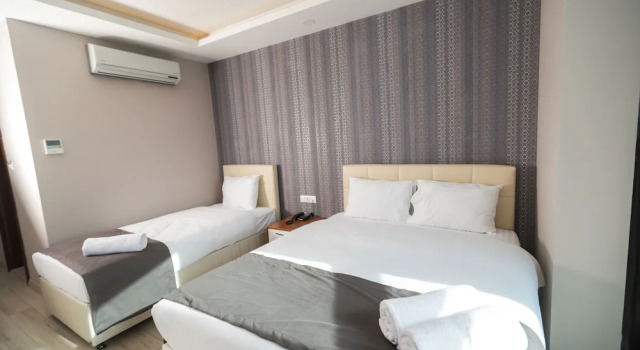 Трёхместный семейный номер Standard Grand Dost Hotel