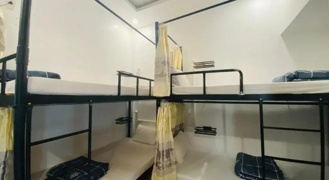 Кровать в общем номере Hue Happy Homestay