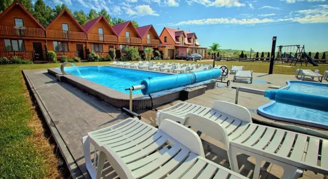 Коттедж Comfortable holiday homes with terraces, pool
