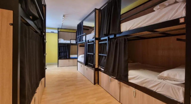 Кровать в общем номере Onefam Les Corts