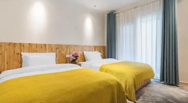 Семейный люкс с 2 комнатами Leshan Fengqiao Yi Garden Inn