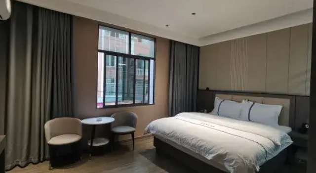 Huazhe Hotel (Mengzi People's Hospital), Boek Hotel Hotels in Mengzi met parkeren, Parkeren