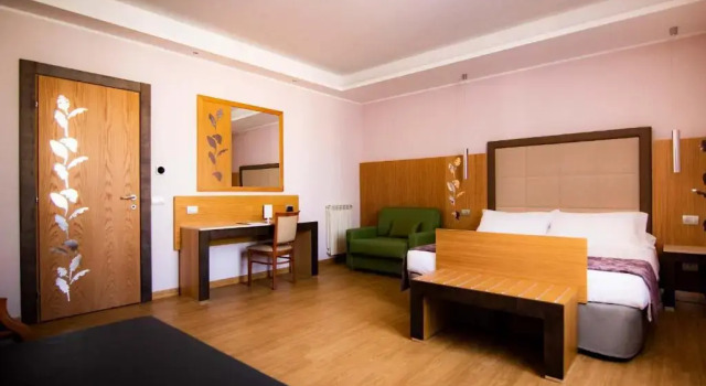 Четырёхместный номер с красивым видом из окна Hotel Giolli Nazionale