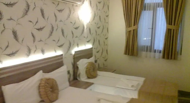 Четырёхместный номер Standard Olimpiyat Hotel Izmir