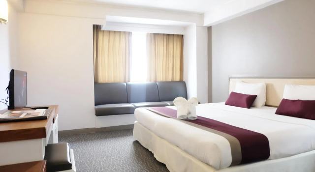 Кровать в общем номере Star Hotel Chiang Mai