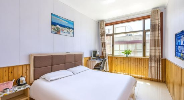 Yuzhong Senshu Business Hotel, Book Hotel Chengguan 