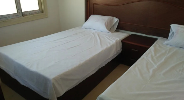 Четырёхместный семейный номер Standard с видом на сад Royal NJ Hotel