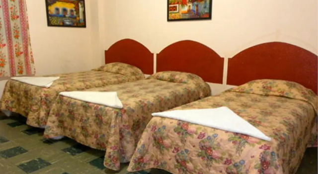 Трёхместный номер Hotel Maya Excelsior