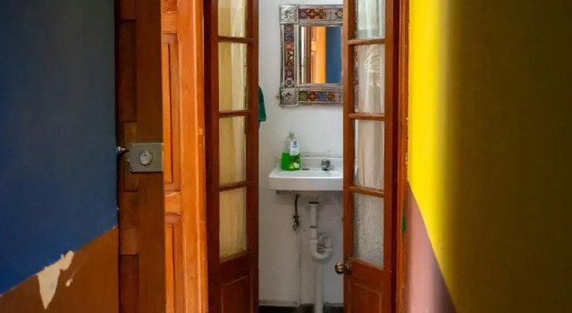 Кровать в общем номере Sukha Hostel San Luis