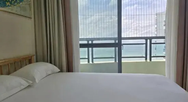 Люкс с 3 комнатами с видом на море Woniu Lvdou Scenic Apartment (Beibuwan No. 1)