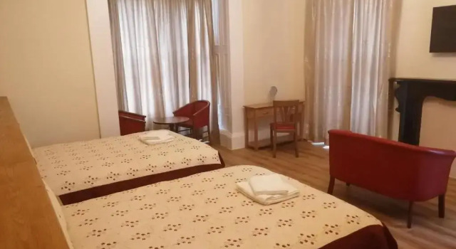 Четырёхместный номер Deluxe Cumberland Hotel