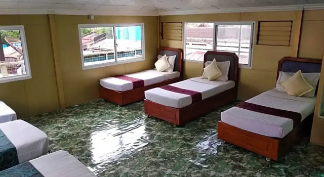 Кровать в общем номере Beautyland Hotel II