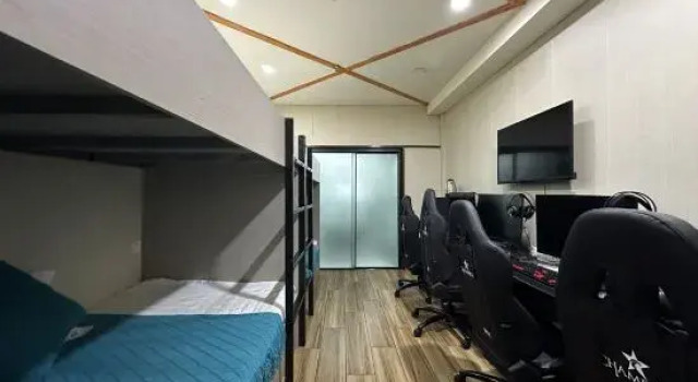 Кровать в общем номере Ant E-Sports Hotel (Huai'an University Town Hancheng Plaza)