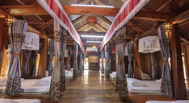 Кровать в общем номере EBINO PULUONG RESORT and SPA