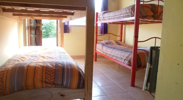 Milenarios Hostel, Забронировать Хостел Отели в центре Эль-Чальтен, в центре, недорого