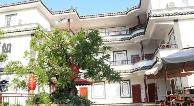Кровать в общем номере Chennong Eco Hotel