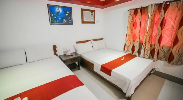 Standardowy czteroosobowy pokój Bataan White Corals Beach Resort