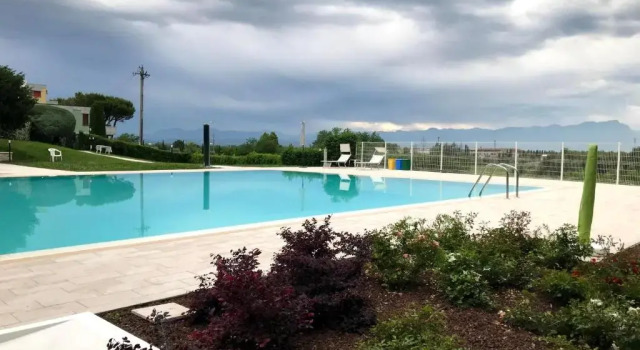 Апартаменты Villaggio Boschetti 10A