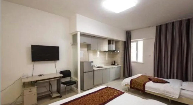 Panjin Xinyuan ApartHotel, Varaa Huoneistohotelli Panjin Liaoning