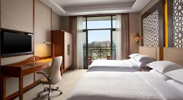 Четырёхместный номер Deluxe с балконом и с видом на сад Sheraton Qingyuan Lion Lake Resort