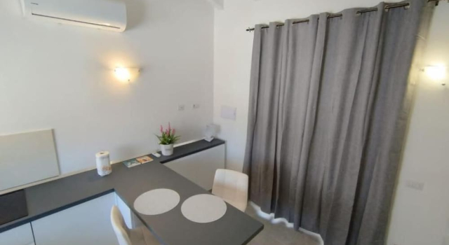 Апартаменты Deluxe Holmann Suite & Rooms