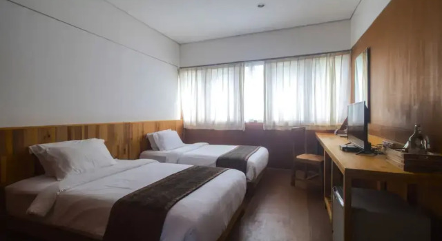 Двухместный номер Deluxe с 2 комнатами с видом на сад Natuna Dive Resort