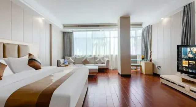 Двухместный люкс Deluxe Jiangdong Yujin Holiday Hotel (Dongguan Gedi Metro Station)