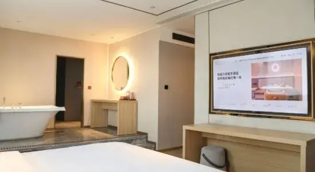 Люкс Deluxe Orange Hotel (Qingdao Jinsha Beach Xiangjiang Road Branch)