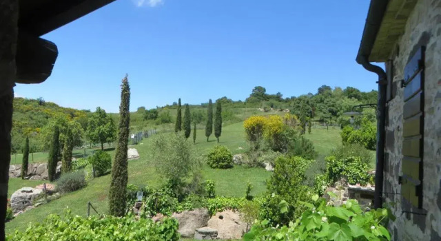 Апартаменты Appartamento Melograno in casale con piscina - Val d'Orcia