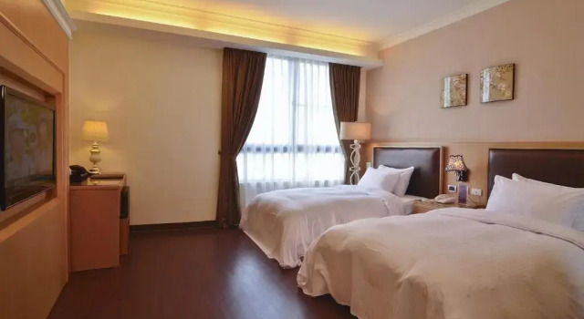 Negócio quarto Hotel Modern Puli