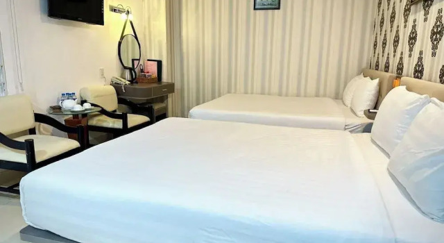 Четырёхместный семейный номер Standard Boss Palace Hotel