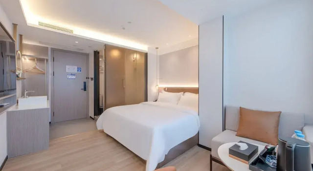 Номер Comfort Huanyi Hotel