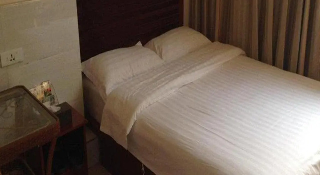 Tianyue Business Hotel, Prenota Hotel Guanghan Sichuan