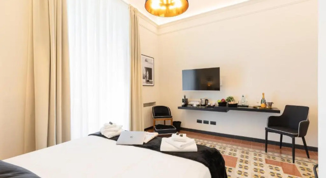 Двухместный номер Deluxe с балконом Foresteria di Piazza Cavour - Luxury Suites & Guest House