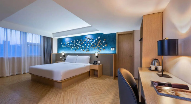 Люкс Business Orange Hotel Qingdao The Mixc