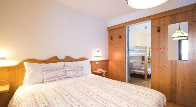 Четырёхместный номер Standard Albergo Vezzana