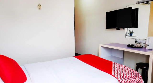 Семейный номер Deluxe с красивым видом из окна OYO 546 Grand City Hotel