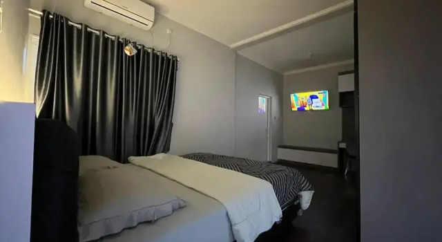 Номер Deluxe Capital O 94208 Homtel Menza plantinum